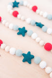 4th of July garland. American decor. Felt stars. Wood bead garland. Red, white & blue. 5ft.
