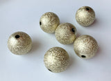 Wholesale gold stardust beads